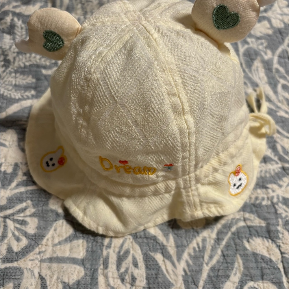 Cute Cream Baby Hat with Embroidered Details